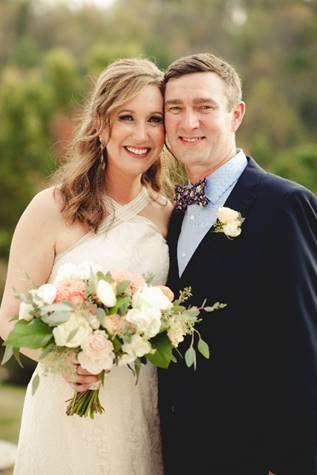A person wearing a wedding dress

Description automatically generated